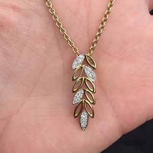 Sterling and gold white sapphire leaf necklace